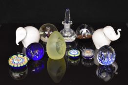 Eleven glass paperweights including Perthshire scent / ink bottle, Caithness Dewdrop Orchid,