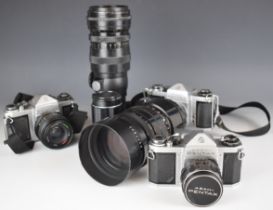 Three Pentax SV 35mm SLR cameras and five lenses comprising 1:1.8/55, 1:3.5/135 and 4/300 lenses,