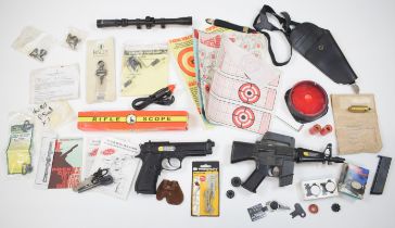 A collection of pistol and similar gun parts and accessories including Weihrauch seals, scope,