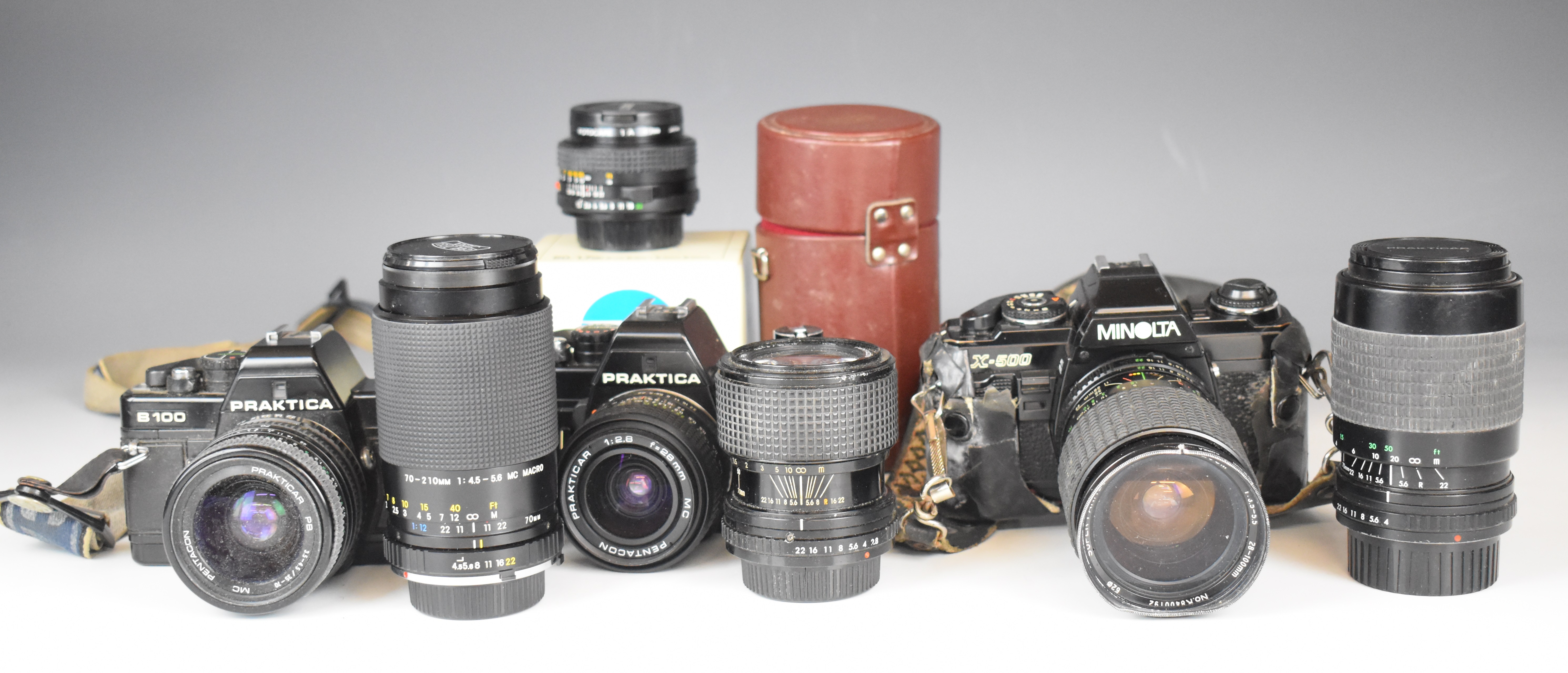Three 35mm SLR cameras comprising Minolta X-500 with Minolta MD 50mm 1:1.7 and Super Paragon 28-
