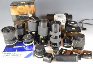 Olympus 35mm SLR camera lenses and accessories including Zukio Auto-S 50mm 1:1.8 and Zukio Auto-W