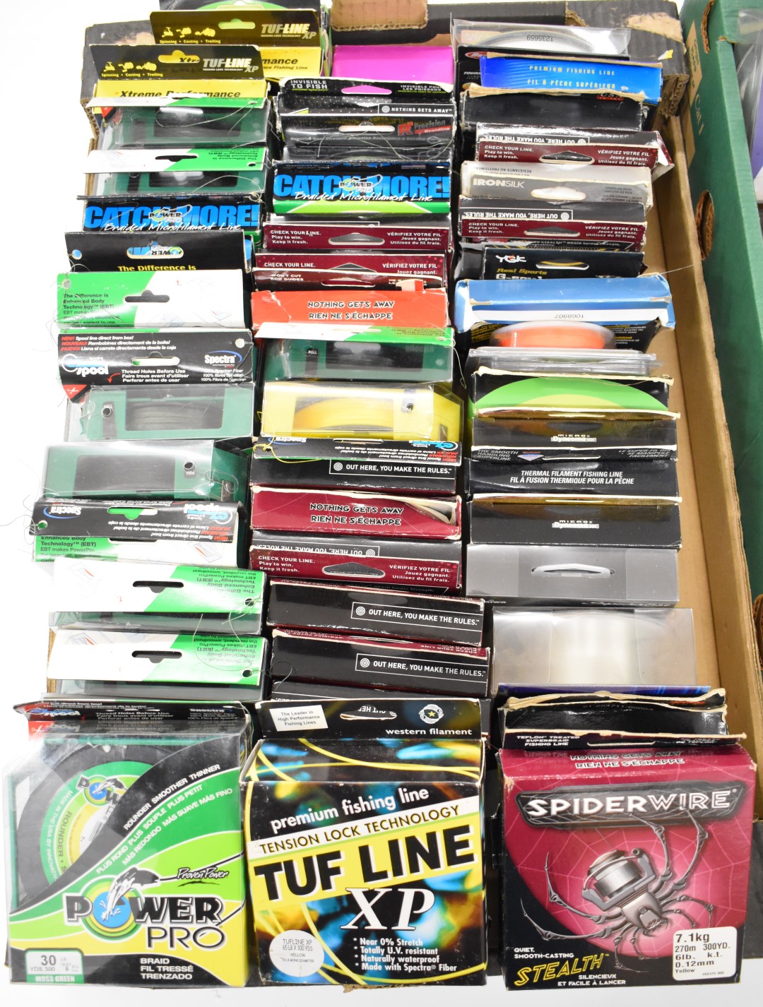 Large quantity of braid and mono fishing line by Penn, Stealth, Power Pro etc, in two trays - Image 2 of 3