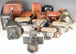 Eight collectable cameras comprising Nikkorex Zoom 35 with 1:3.5 f=43-86mm lens, Lubitel 2 and 166bB