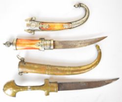 Two Jambiya daggers, both with decorated hilts and scabbards, longest blade 19cm. PLEASE NOTE ALL