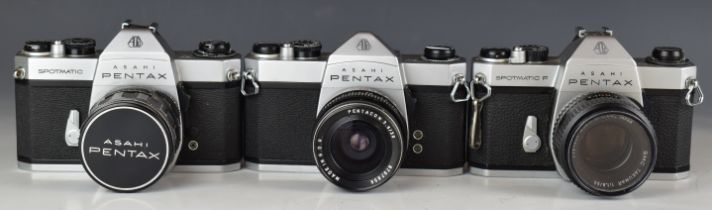 Three Pentax 35mm SLR cameras comprising Spotmatic SP  F, SP II and SP500, with 1:3.5/28, 3.5/30 and