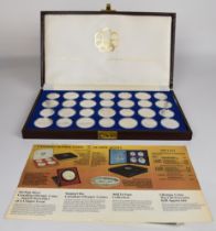 Cased set of twenty eight 925 silver Canadian Olympics commemorative coins, total weight of silver