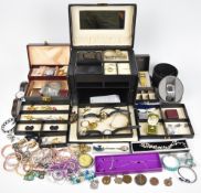 A collection of costume jewellery including two Swarovski brooches, two silver rings, Citizen Eco-