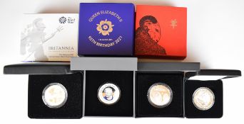 Four various 1oz cased silver coins including 'Year Of The Sheep', 2017 Britannia, etc