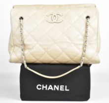 Chanel Hampton large handbag in pale beige leather with signature Chanel logo to the front and