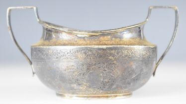 Edward VII hallmarked silver twin handled sugar bowl in the Georgian style, with bright cut