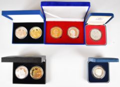 Two Royal Mint cased silver proof commemorative coins, together with three cased pairs of silver and