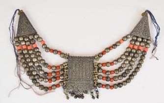 Yemenite tribal necklace made up of white metal and coral coloured glass beads