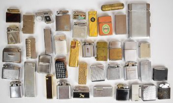 A collection of over forty cigarette lighters including Ronson, Zippo, Colibri and Sarome. PLEASE