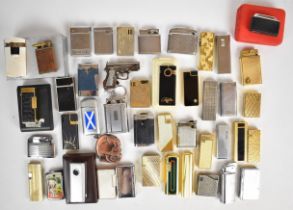 A collection of over forty cigarette lighters to include Colibri and Ronson. PLEASE NOTE WE ARE