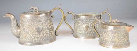 19th century Indian silver bachelor's tea set with repoussé decoration, vacant cartouches and