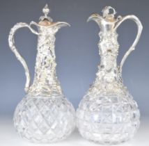 Two Victorian silver plated and cut glass claret jugs with vine decoration, height 30cm