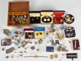A collection of jewellery including cufflinks, studs, rolled gold rings, watches, four silver