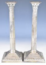 Pair of Georgian hallmarked silver Corinthian column candlesticks with stepped bases and gadrooned