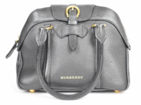 Burberry Milverton handbag in black grained leather with signature Burberry lining and gold