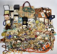 A collection of costume jewellery including silver chains, vintage brooches, malachite necklace,