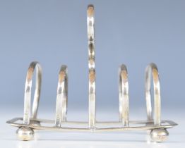 George V hallmarked silver five bar toast rack raised on ball feet, Birmingham 1922, maker