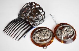 Carved tortoiseshell hair slide or comb together with a tortoiseshell and silver plated belt buckle,