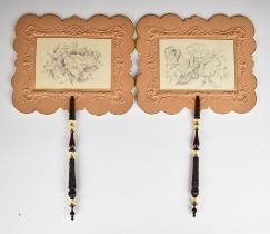Pair of embossed card and gilt, turned and carved wood handled hand held fire screens, overall