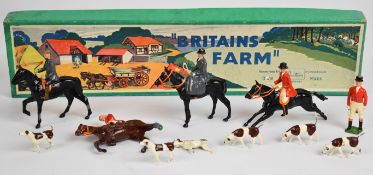 Britains vintage lead hunting party figures comprising four mounted, one on foot and six hounds,