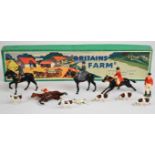 Britains vintage lead hunting party figures comprising four mounted, one on foot and six hounds,