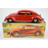 Distler clockwork pressed tin Split Window VW Beetle with red body, silver hubs and D-3070