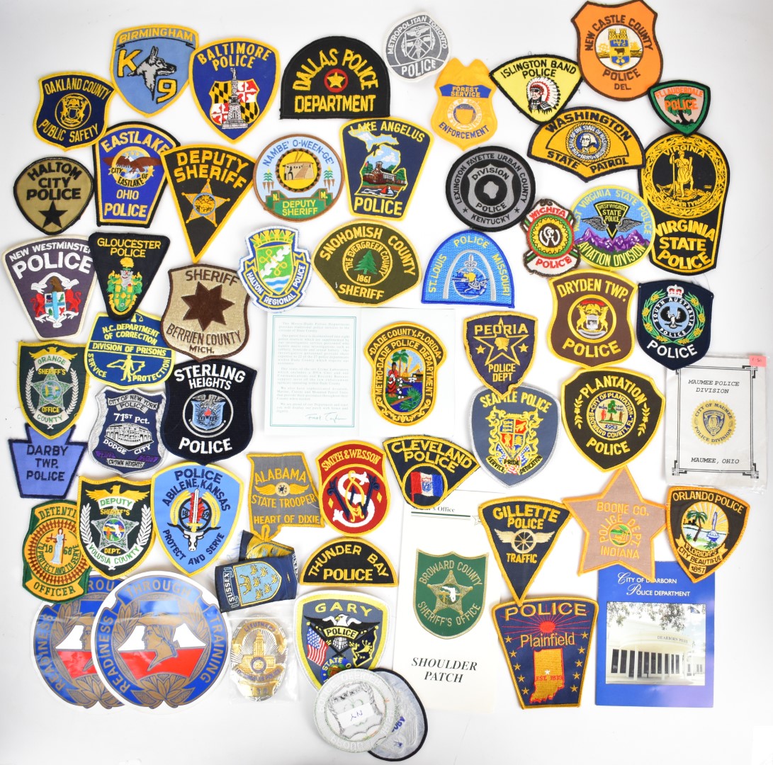 Large collection of approximately 300 American Police cloth badges including Parkland Police, County