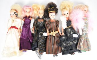 Six vintage Sindy dolls by Pedigree in evening dress outfits to include Gala Night, Masquerade and