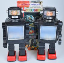 Two battery operated plastic body 'Super Space Explorer' robots by Hong Kong Toys, height 28cm,