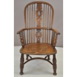 19thC elm seated Windsor armchair with pierced back splats and yew armrests
