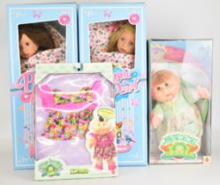 Three vinyl bodied dolls comprising two Bonnie and Pearl and one Cabbage Patch Kids, together with a