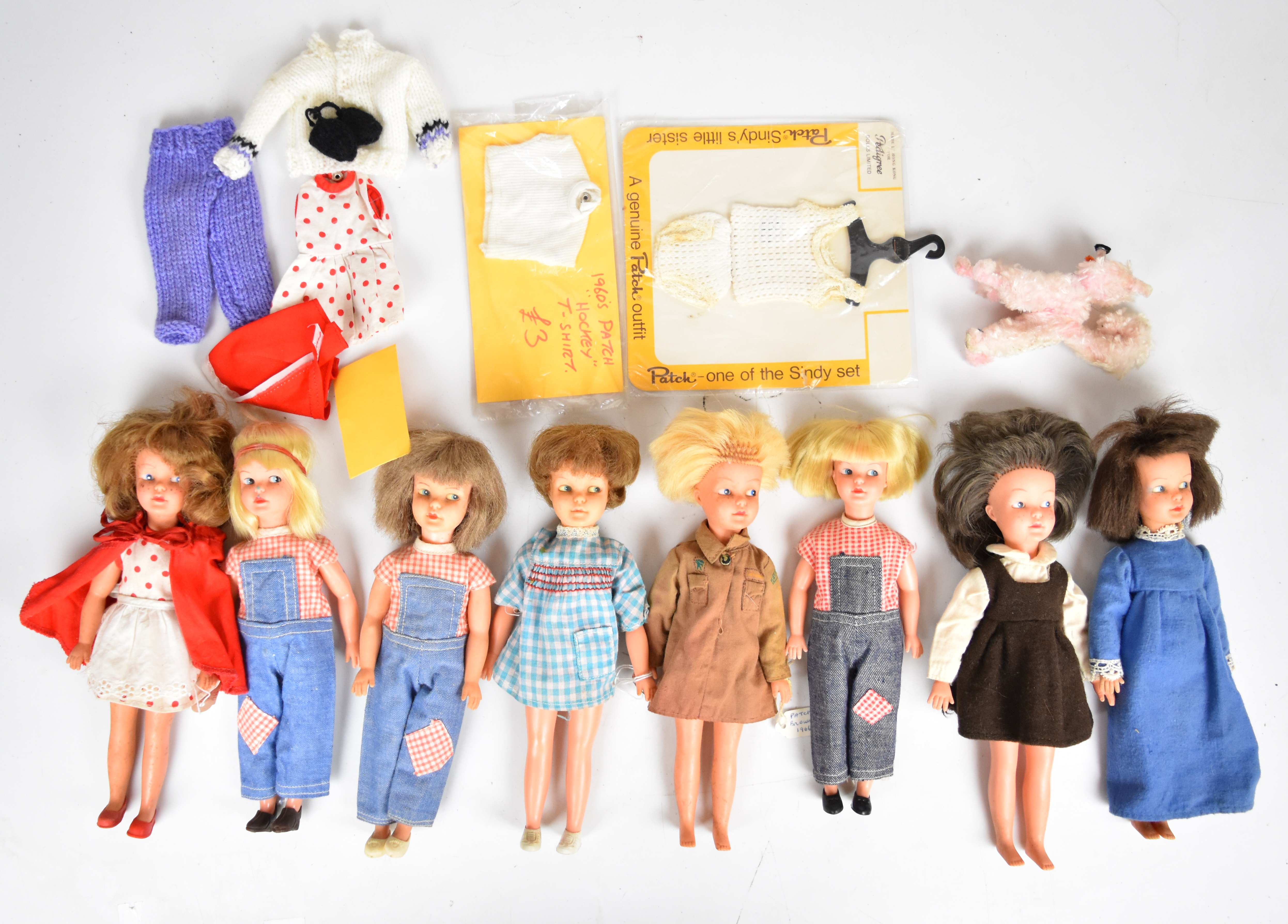 Eight vintage Sindy Patch dolls by Pedigree dressed in original 1960's outfits, together with a