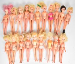 Twenty vintage Sindy dolls by Pedigree dating to the 1970's & 80's.