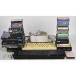 A collection of retro computing items to include BBC Microcomputers, Spectrum QL Acorn Electron,