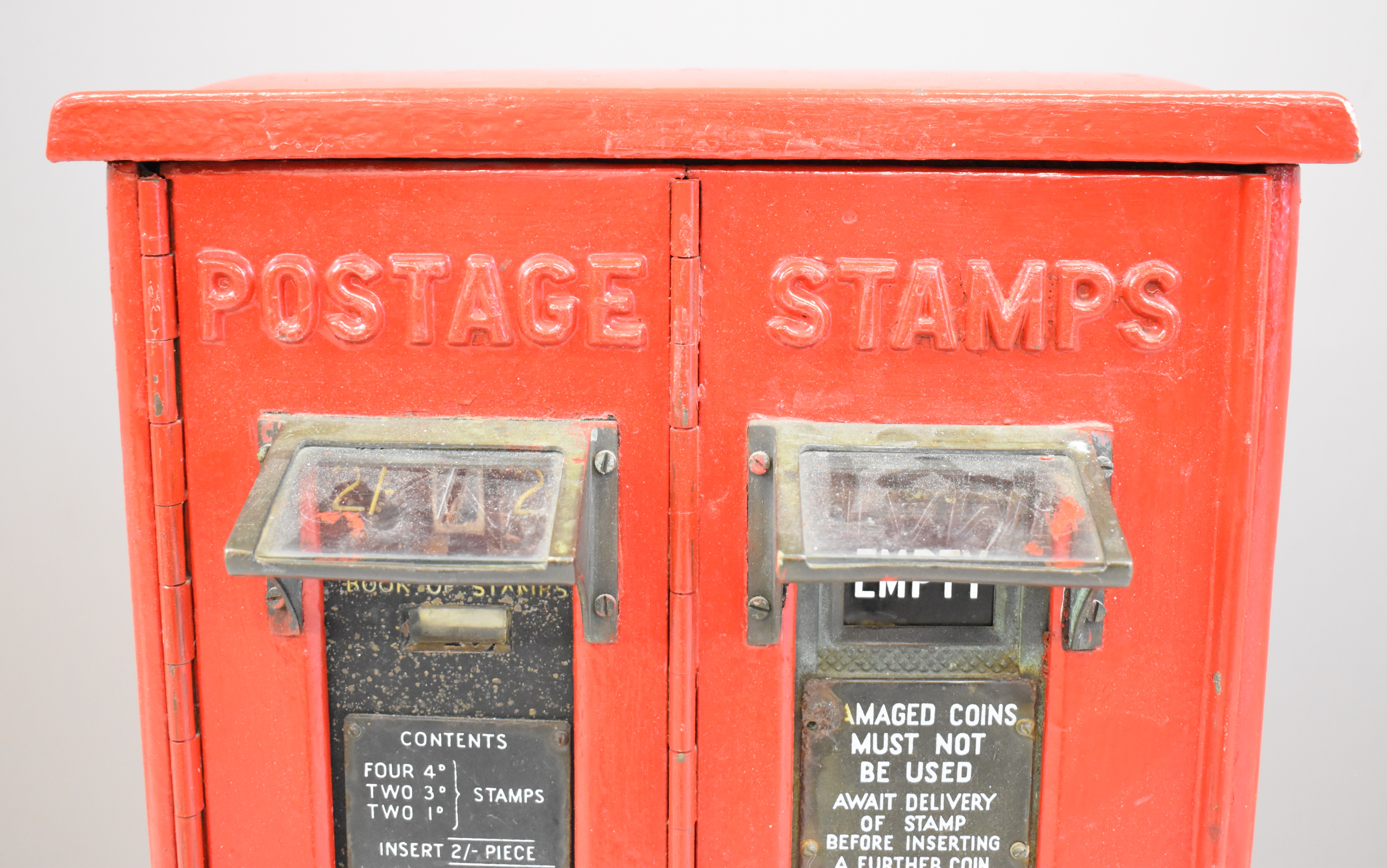 Cast iron postage stamps machine with two sections each housing a machine, overall height 64.5cm, - Image 4 of 7