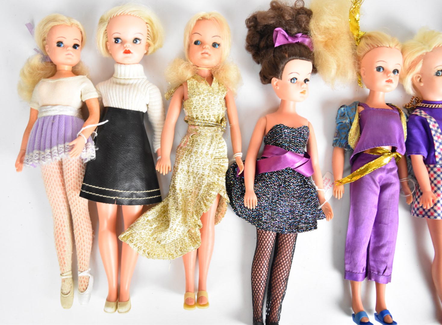 Ten vintage Sindy dolls by Pedigree dressed in clothing ranging from the 1960's to 80's. - Image 4 of 4