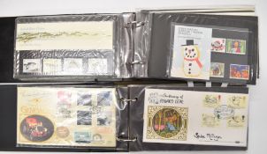 A small collection of first day covers in two folders, some signed including examples by Spike