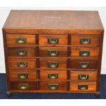 Collector's chest of fifteen drawers with campaign style handles, W71.5 x D41 x H60cm