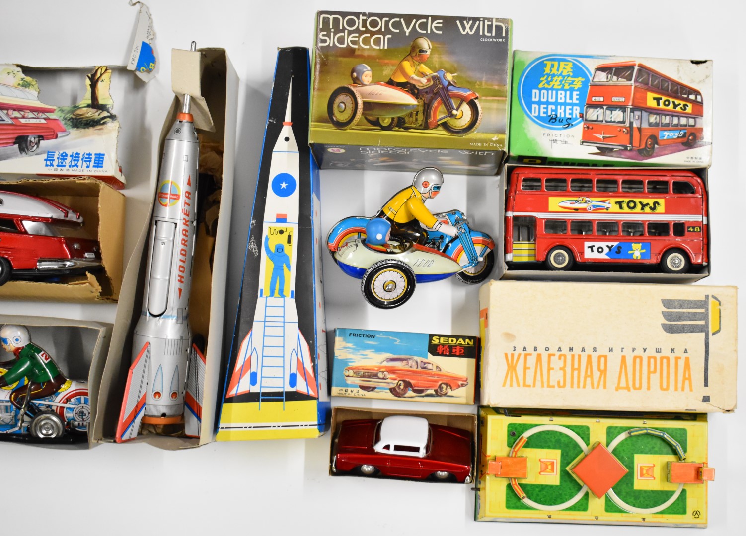 Seven tinplate clockwork toys, mostly Chinese and Russian, to include space rocket, double decker - Image 3 of 3