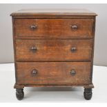 19thC oak bachelor's chest of three graduated drawers, raised on turned feet, W72 x D51 x H80cm