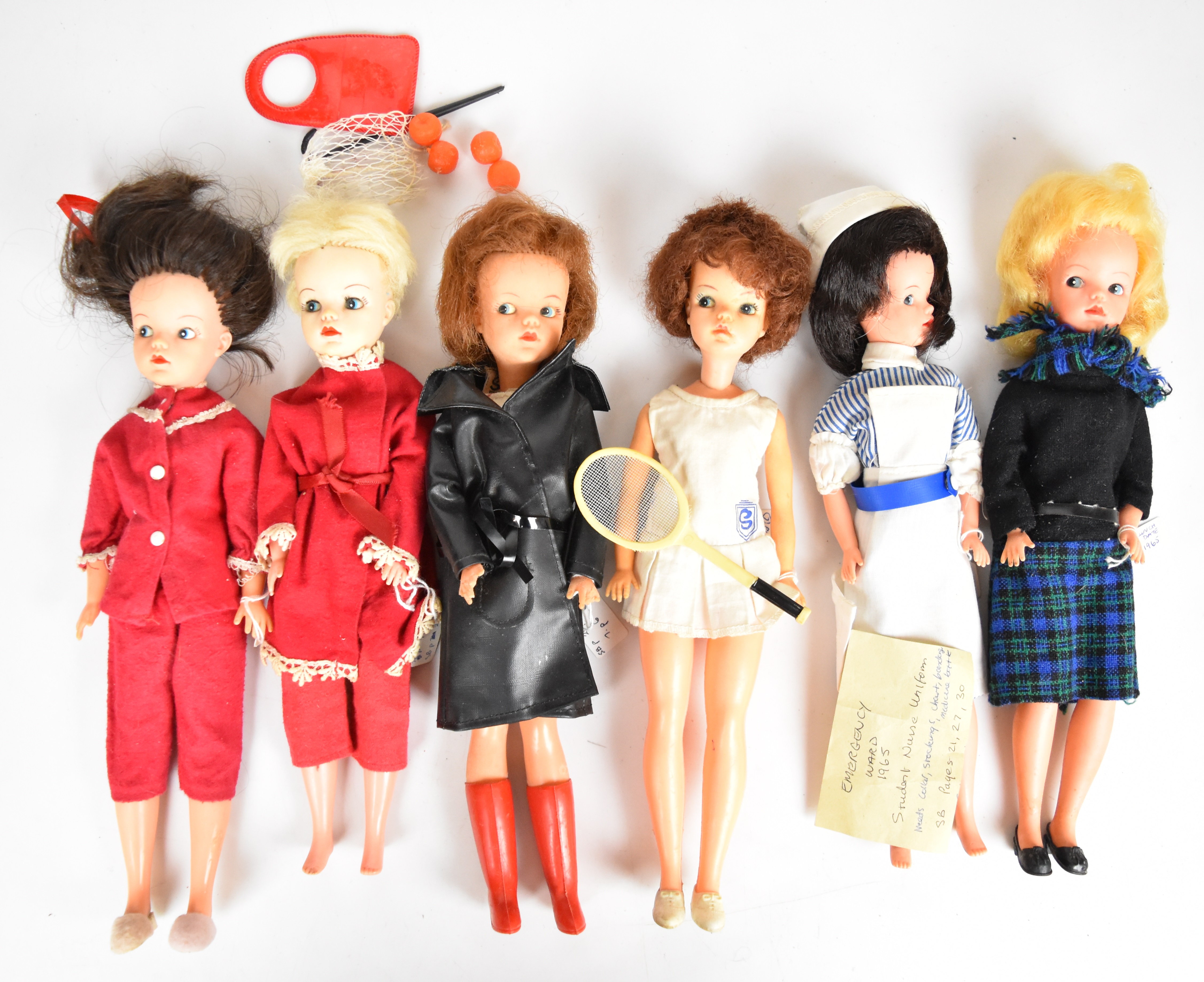 Six vintage Sindy dolls by Pedigree in original outfits to include Frosty Nights, Centre Court,