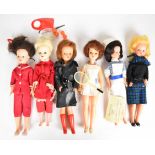 Six vintage Sindy dolls by Pedigree in original outfits to include Frosty Nights, Centre Court,