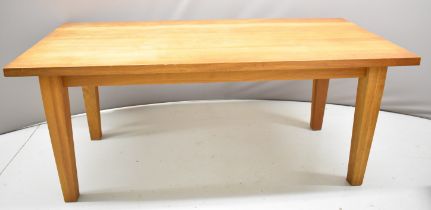Modern oak dining table raised on square tapering legs, L180 x W85 x H75cm