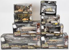 Eight Unimax Forces of Valour 1:72 and 1:32 scale diecast model tanks and similar military