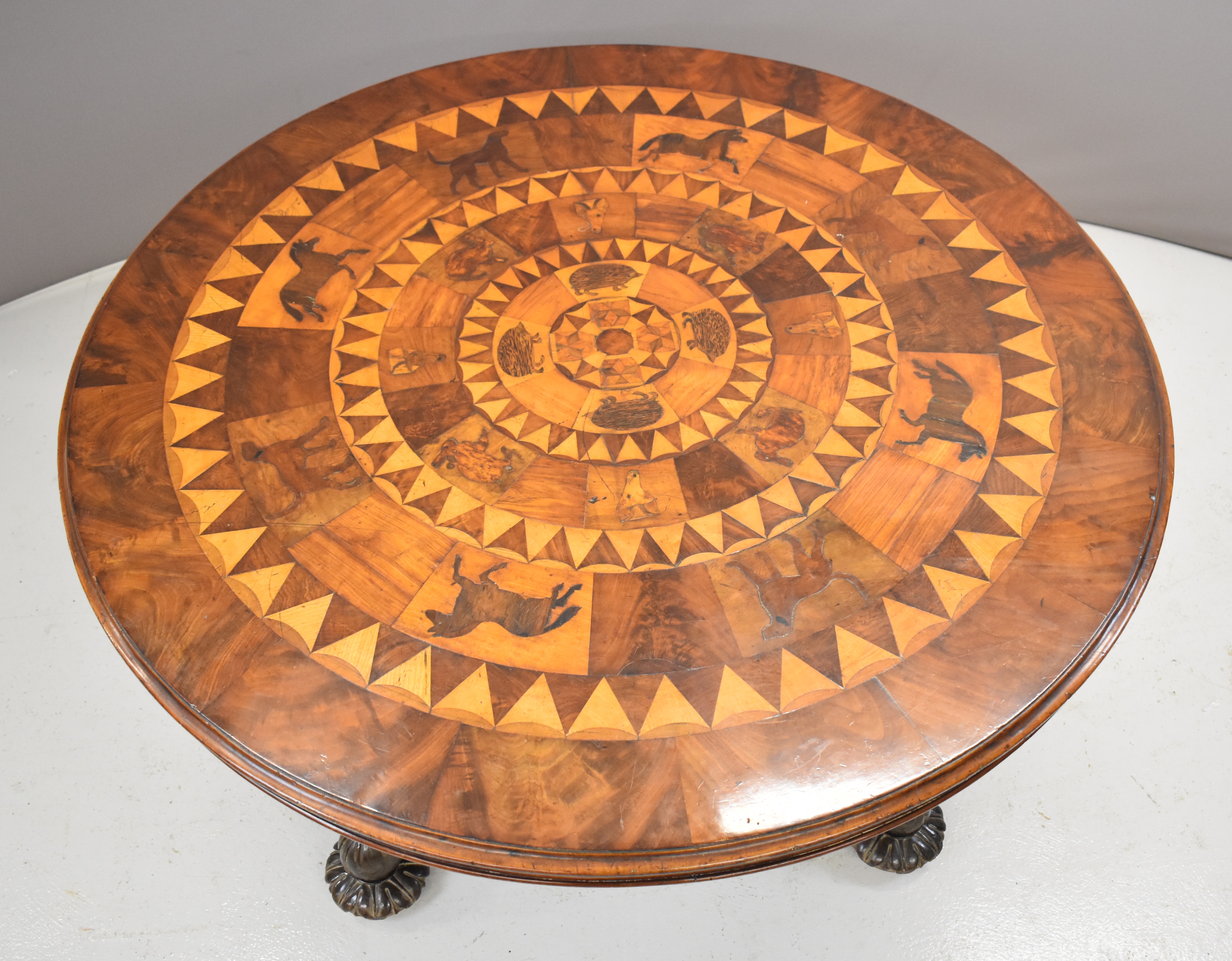 19thC parquetry and marquetry fruitwood, mahogany and specimen wood hall table with inlaid animals - Image 4 of 6