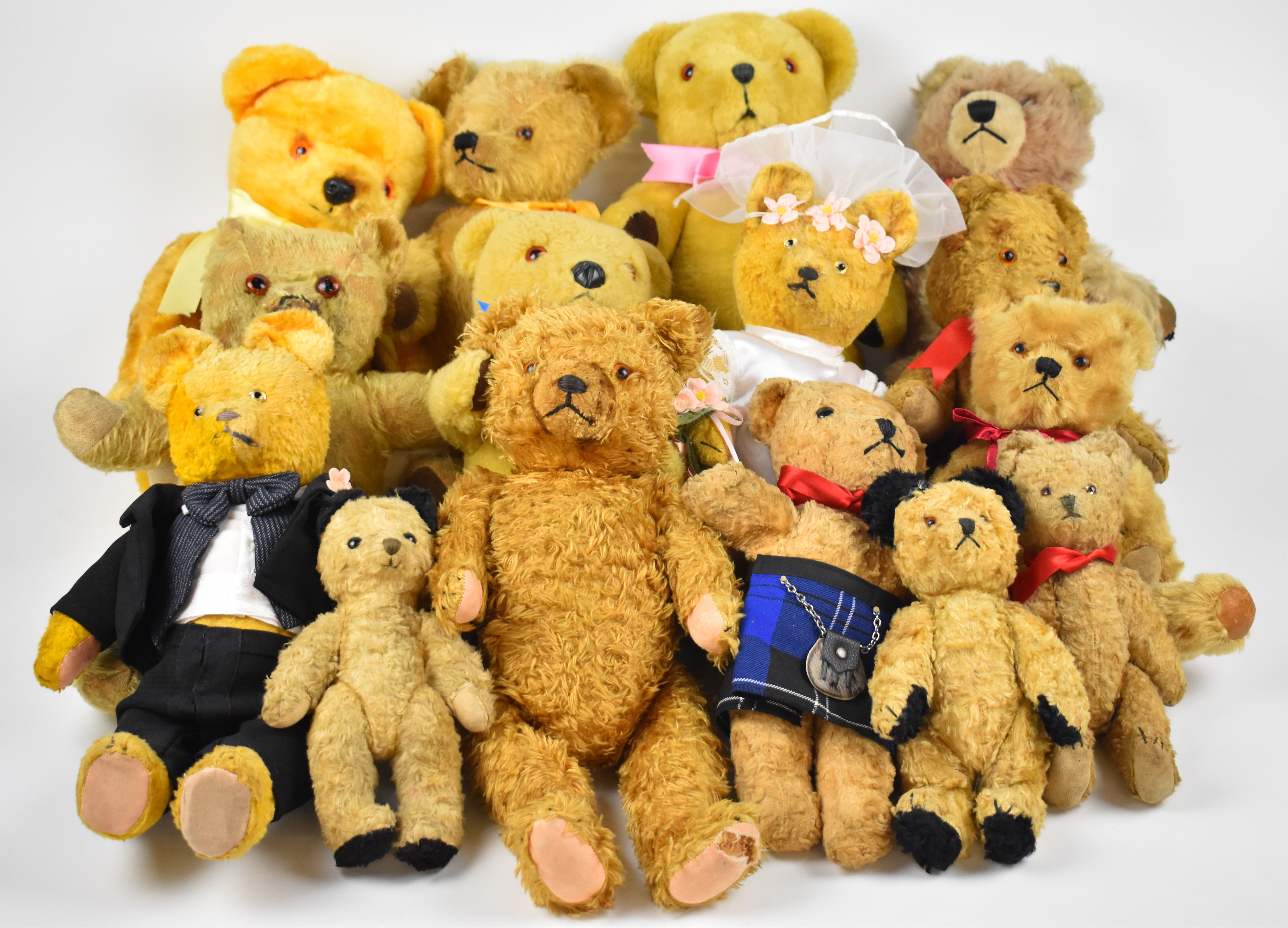 Fifteen vintage Chiltern, Chad Valley and similar Teddy bears, tallest 50cm.